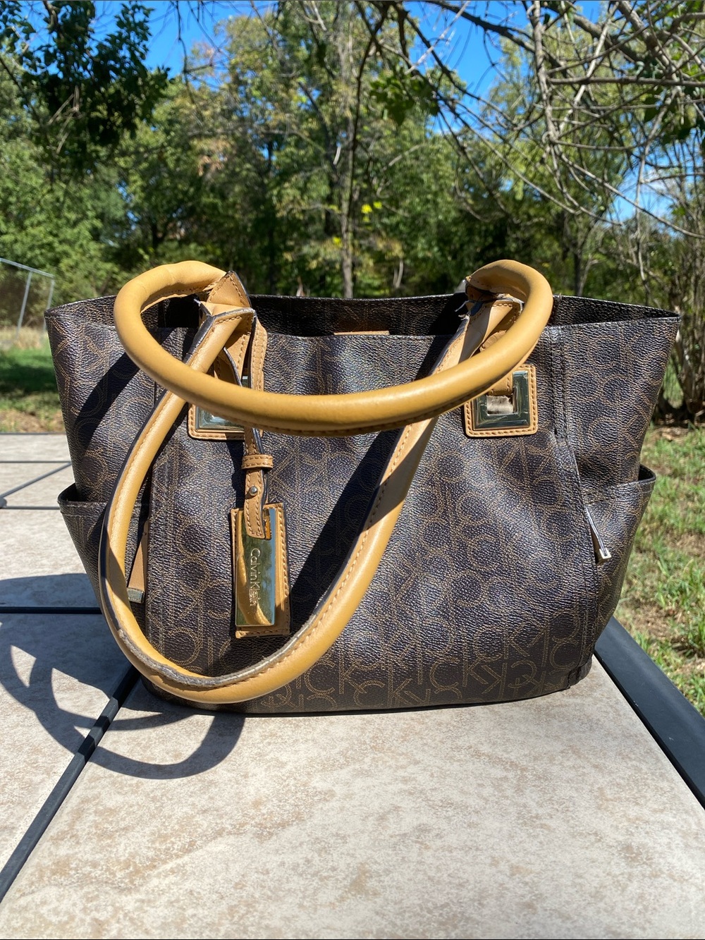 Calvin Klein Signature Monogram Tote Bag Camel Brown Leather Handles Charm Tag